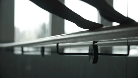 Modern contemporary dancer dancing while holding onto dance hand rail Vídeos de archivo 104271286