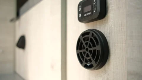 Modern control panel in caravan with buttons and ventilation fan Stock Footage 327594647