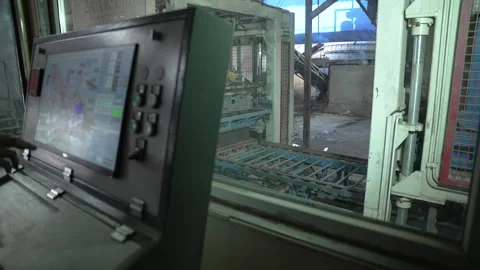 A modern control panel is seen in an industrial setting managing machinery Video stock 314790239
