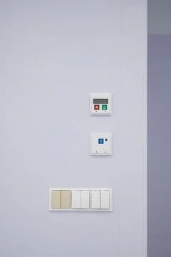 Modern Control Panels and Electrical Outlets on a hospital Wall Stock Photos