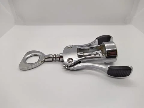 Modern corkscrew on a white background side view Stock Photos