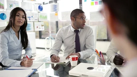 Modern corporate office workers discussing project over boardroom table Stock-Footage 80914738