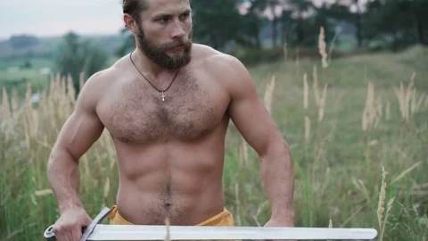 Modern cossack workouts with swords in the fields 4K Stock Footage 80529686