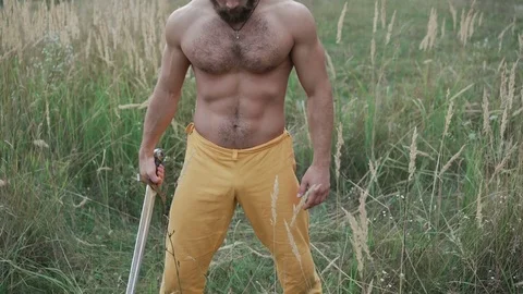 Modern cossack workouts with swords in the fields 4K Stock Footage 80529997