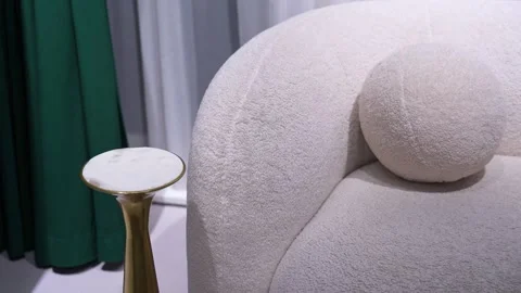 Modern Cream Boucle Sofa And Marble Side Table Stock Footage 337663177