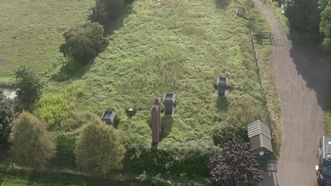 Modern Cube Skylights and Brick Chimney, Overgrown Meadow, Aerial Drone View Stock-Footage 341324311
