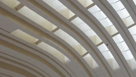 Modern Curved Architectural Ceiling with Skylights and Geometric Design Vídeo Stock 345967802