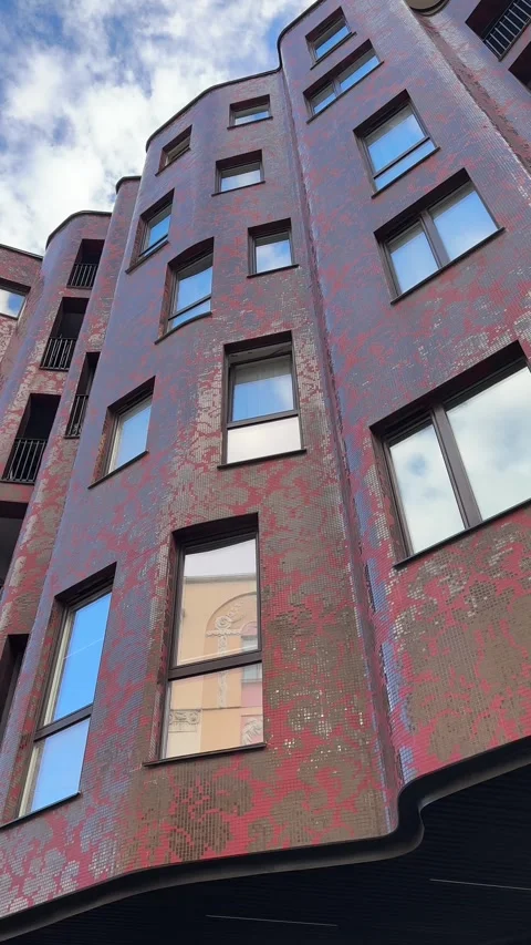 Modern Curved Building Facade with Mosaic Tiles, Low Angle View Stock Footage 345002151
