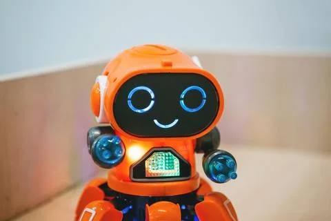 Modern cute robots. Funny smiling robot. Stock Photos