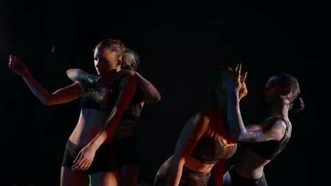 Modern dance performance, dancing theatre, four dancers women in paints in Stock-Footage 168123314