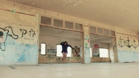 Modern dancer in an abandoned hall Stock Footage 81275952