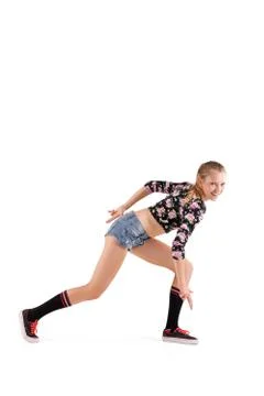 Modern dancer poses in front of studio background Stock Photos