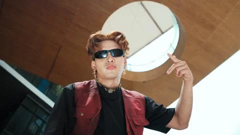 Modern dancer posing at camera with confident with low angle camera. Endeavor. 스톡 사진