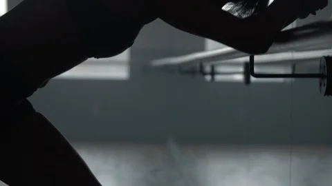 Modern dancer using dance studio hand rail to warm up and stretch Vídeo Stock 104269145