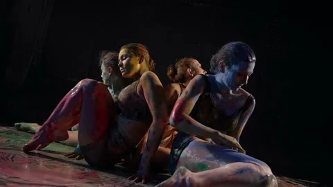 Modern dancers practice performing with body paint Stock Footage 155579827