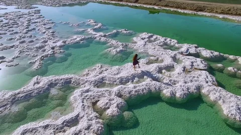 Modern dancing on solt dead sea Stock Footage 80750479