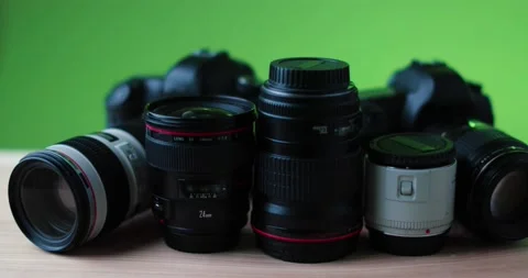 Modern dark green studio background on high quality photo camera equipment Stock Footage 237546565