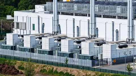 Modern Data Center with Large Solar Array and Cooling Systems Stock Photos