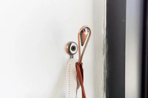 Modern decorative wall hook with a hanging fabric bag 写真素材
