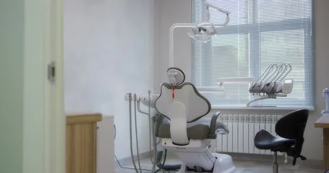 Modern dental clinic. Empty minimalistic dental office with dental chair. Stock Footage 166823027