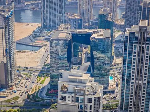 Modern design and shape facade skyscraper in Dubai downtown, near Business bay 库存照片