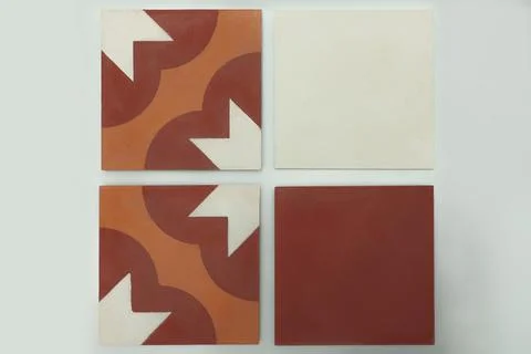 Modern design of concrete tiles with a pattern from white to brown shade Stock Photos