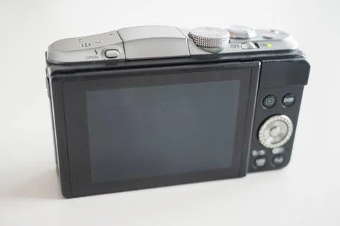 Modern design mirrorless digital camera its back facing out Stock Photos