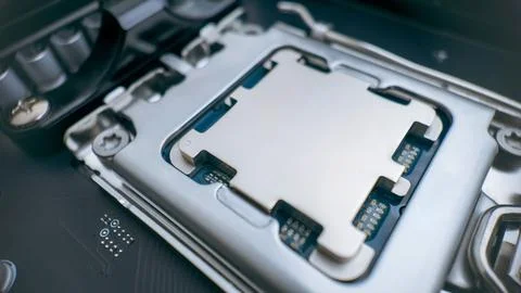 Modern desktop processor installed in motherboard socket, close up of cpu c.. 스톡 사진