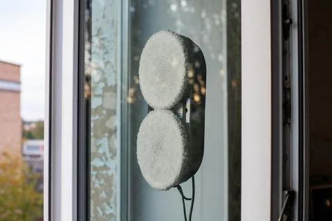 Modern device, a robot window cleaner for cleaning glass from dirt and stre.. Stock Photos