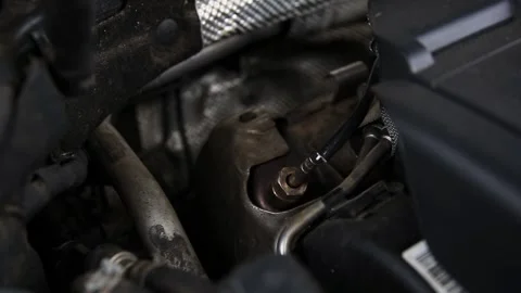 A modern diesel engine's lambda probe. Details of a car engine, showing the Stock Footage 326748845