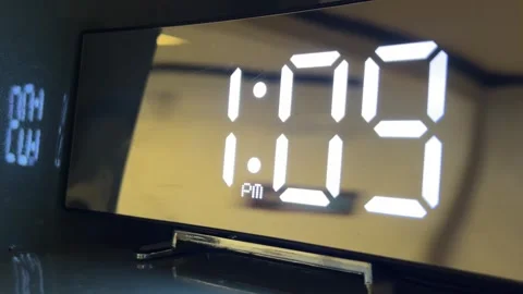 Modern digital alarm clock with a mirror finish 動画素材 328229667