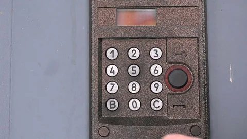 Modern digital intercom system mounted outdoors Stock Footage 70217153