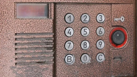 Modern digital intercom system mounted outdoors Stock Footage 71508633