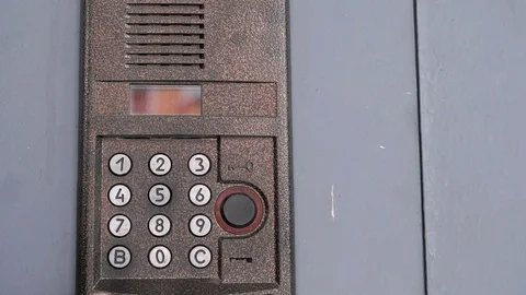 Modern digital intercom system mounted outdoors Stock Footage 71509061