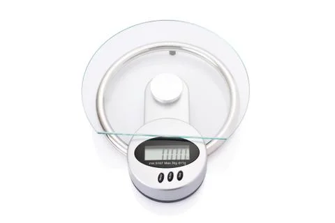 Modern digital kitchen scale isolated on white background. Stock Photos