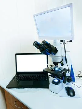 Modern digital microscope equipped with camera, computer in laboratory 스톡 사진