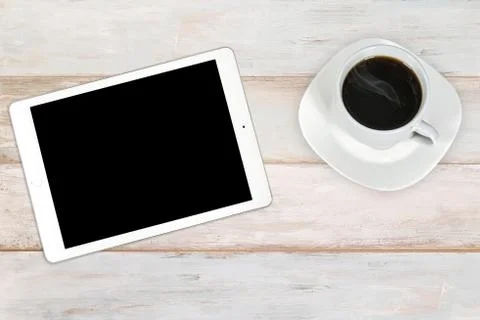 Modern digital tablet with coffee Stock Photos