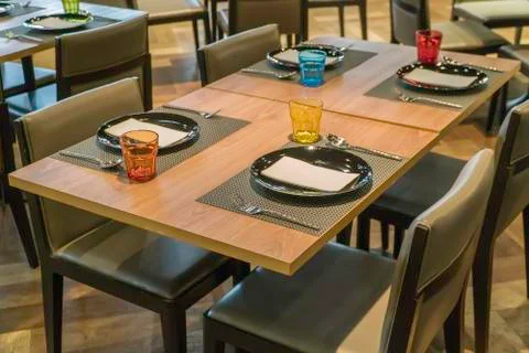 Modern dining room with dining table. Small depth of field Stock Photos