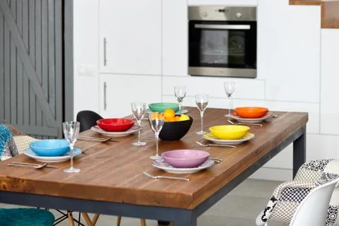 Modern dining room with dining table.  Small depth of field Stock Photos