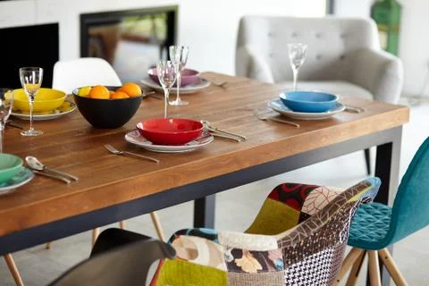 Modern dining room with dining table.  Small depth of field Stock Photos