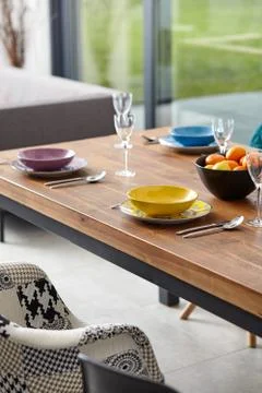 Modern dining room with dining table.  Small depth of field Stock Photos