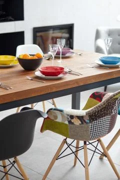 Modern dining room with dining table.  Small depth of field Stock Photos