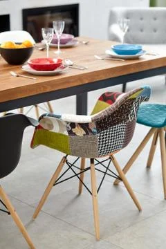 Modern dining room with dining table.  Small depth of field Stock Photos