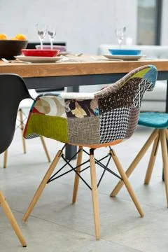 Modern dining room with dining table.  Small depth of field Stock Photos