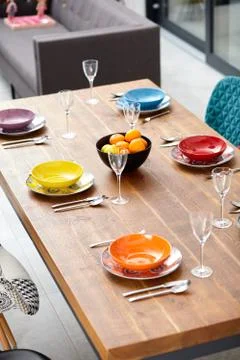 Modern dining room with dining table.  Small depth of field Stock Photos