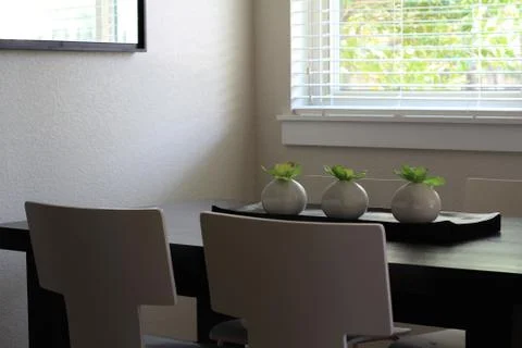Modern dining room table and chairs Stock Photos