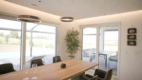 Modern Dining Room with Wooden Table, Large Panorama Windows, Wide Shot Stock-Footage 341567843