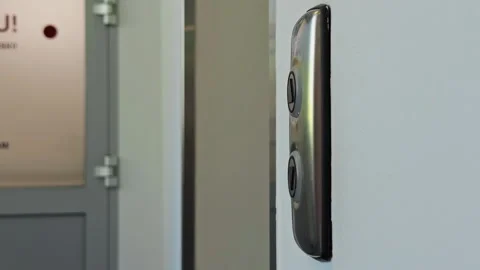 A Modern Doorbell Camera Mounted Securely on the Wall Live Streaming HighQuality Stock Footage 309831973