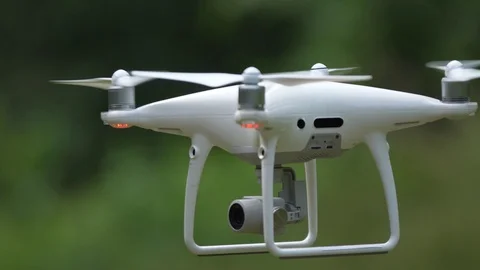 Modern drone slips around its own axis in flight. Stock Footage 90756766