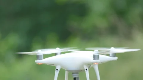 Modern drone takes off, slips in flight around its own axis. Stock Footage 90756769
